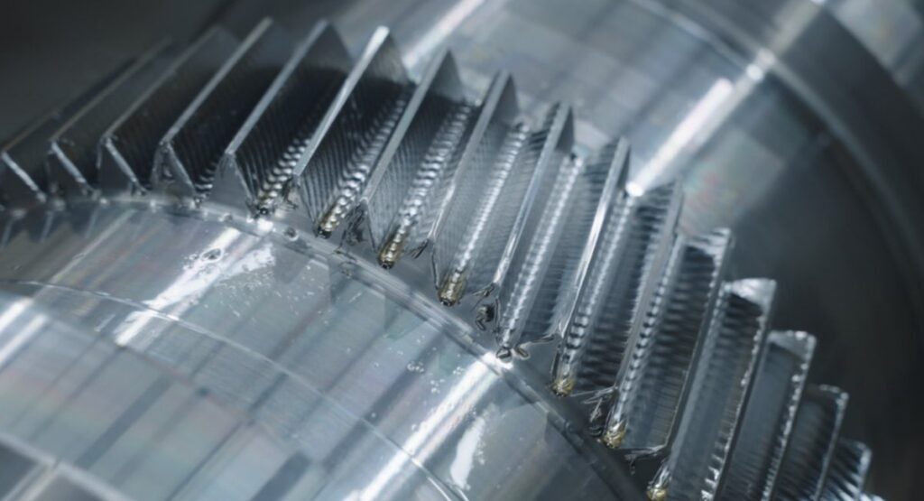 One-piece pinions for high-speed applications cover